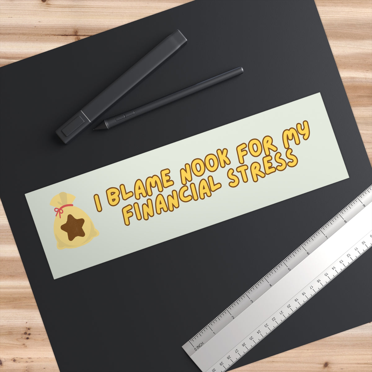 I BLAME NOOK FOR MY FINANCIAL STRESS BUMPER STICKER (PEAR GREEN)