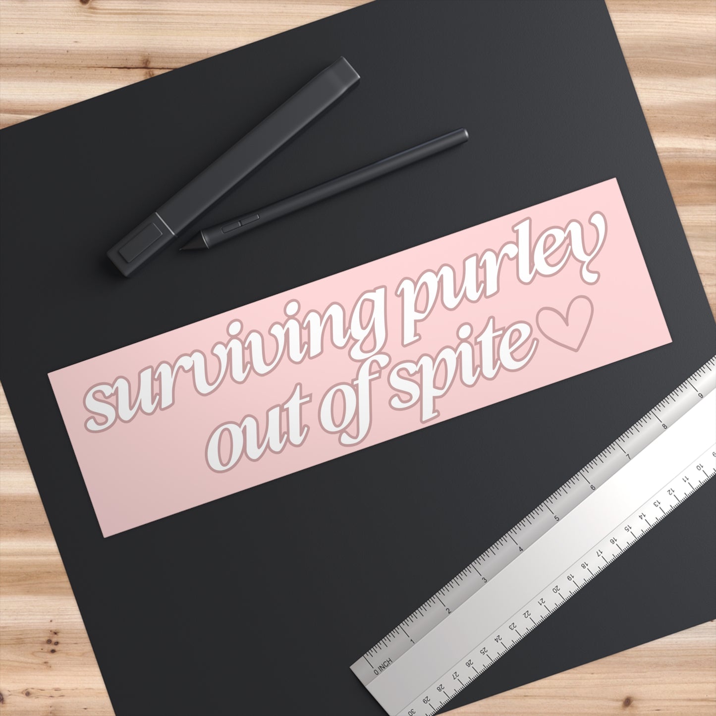 Surviving Purely Out of Spite 11x3 in Bumper Sticker (Matte Finish)
