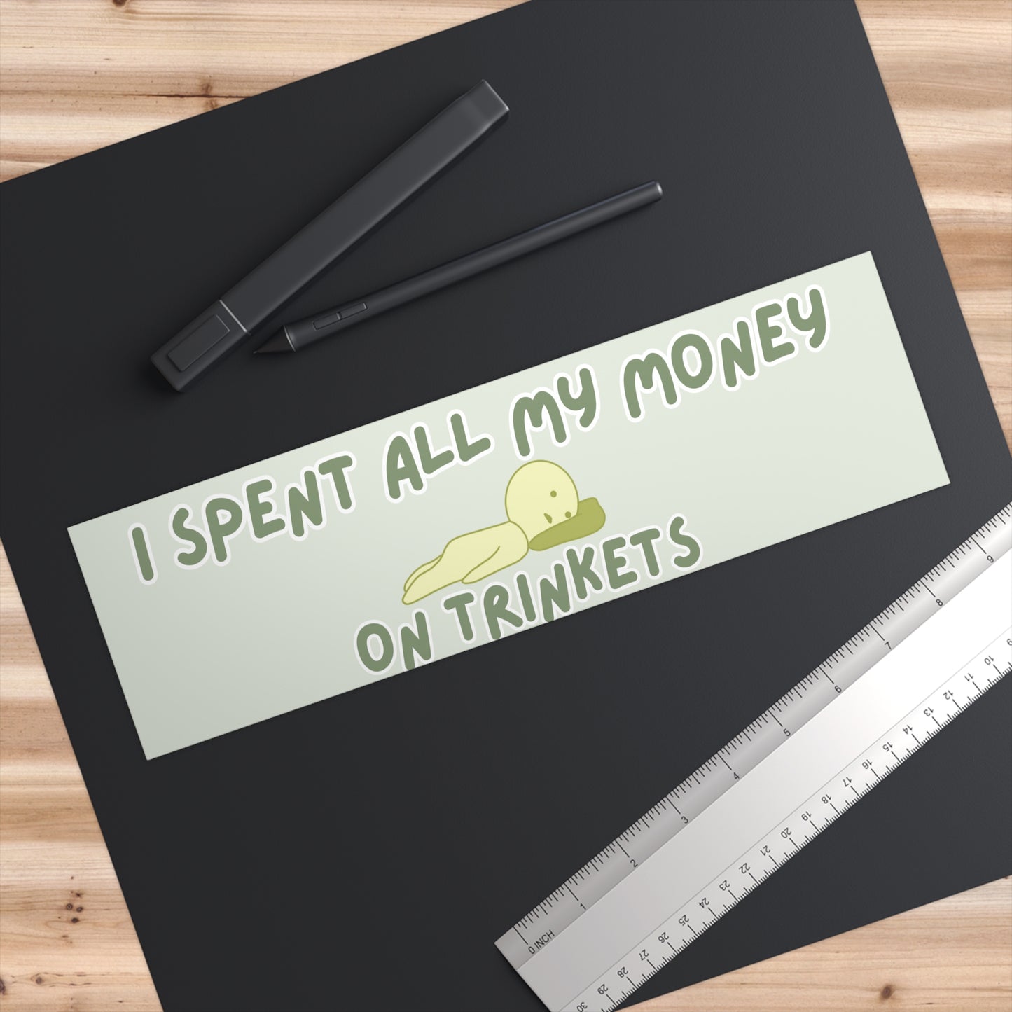 I Spent All My Money on Trinkets 11x3 in Bumper Sticker (Matte Finish)