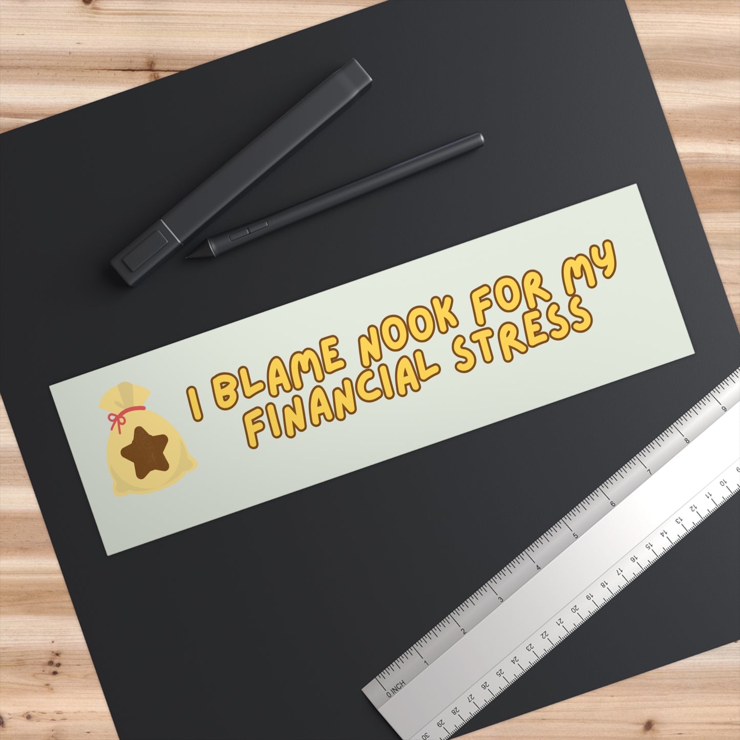 I BLAME NOOK FOR MY FINANCIAL STRESS BUMPER STICKER (PEAR GREEN)