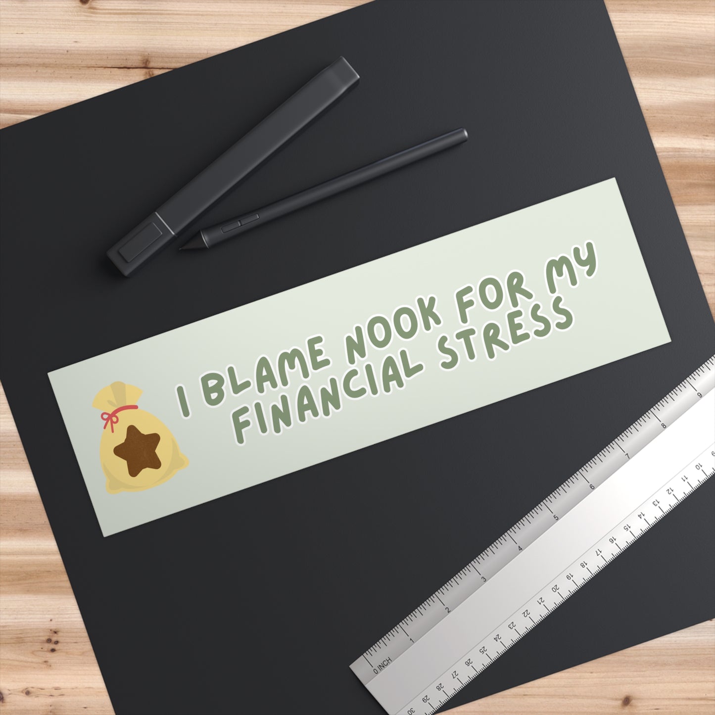 I BLAME NOOK FOR MY FINANCIAL STRESS BUMPER STICKER (Green font)